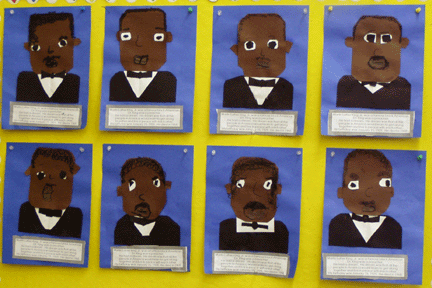 Student-created Martin Luther King Jr. portraits displayed together
